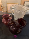 Three glass water pitchers