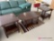 Three piece living room table set to end tables one coffee dark wood
