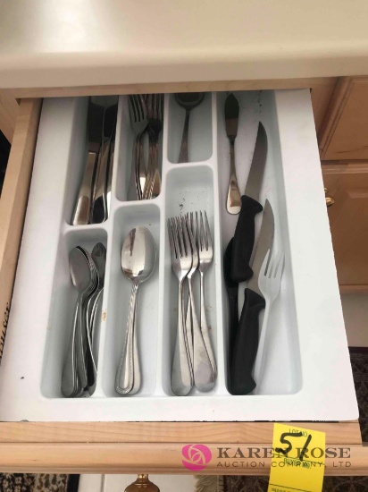 Drawer of flatware and kitchen ware