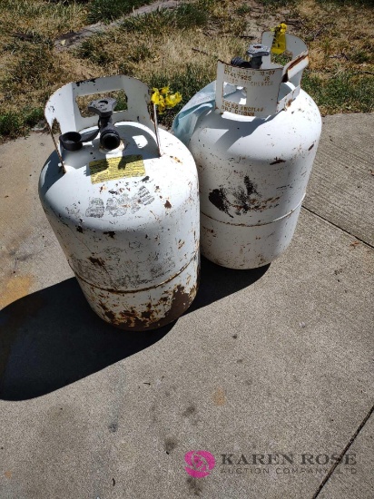 two 25 lb propane tanks