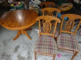 42-in round pedestal table with four chairs