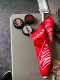 Red wings flag and three pucks