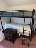 Upstairs,Set of bunk beds And two drawer nightstand,with mattresses clean