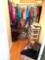 Contents of closet ladies clothes shoe racks Bose purses in B3