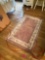 Three pink rugs in B4