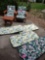 two wood patio chairs, table, and extra cushions