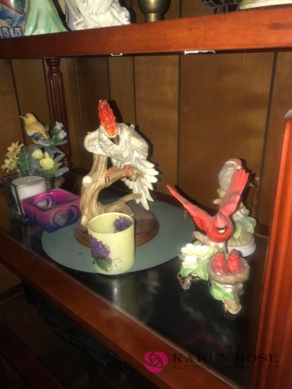 Bird figurines and candles