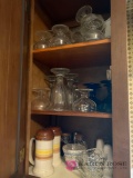 Kitchen cabinet with ice cream glasses and miscellaneous