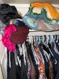 Contents of front entryway closet ladies clothes hats purses