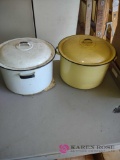 two enamelware lidded pots