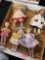 Five porcelain dolls