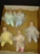 5 six inch tall porcelain dolls