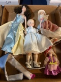 four porcelain dolls