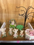 Four fairy knickknacks snow globe and other miscellaneous