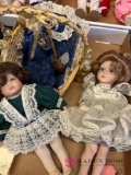 three jointed porcelain dolls