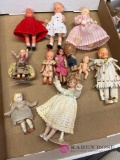 10 vintage plastic and porcelain dolls