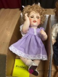 12 in jointed porcelain doll Mc Nees