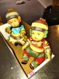 two sitting 8 inch jointed Japanese porcelain dolls