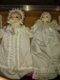 one 10-in and one 12 inch porcelain doll