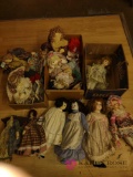 approximately 20 assorted cloth and porcelain dolls