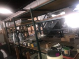 Steel shelving unit approximately 12 foot long 8 foot high 3 feet deep bolted together