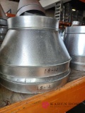 two 18-12 galvanized reducers