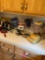 Contents of left side of sink on countertop small appliances and miscellaneous