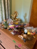 Lots of assorted knickknacks animals birds and miscellaneous