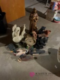 Yard ornaments and duck figures in basement