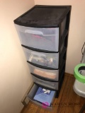 storage cabinet with office supplies/batteries