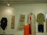 assorted ladies clothing and tapestry