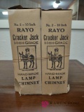 two rayo cracker Jack lamp chimneys