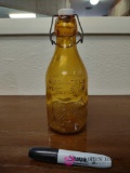 Amber milk bottle