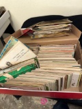 shoe box full of vintage postcards