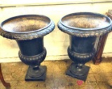 24 inch tall by 20-in cast iron urns