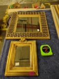 two small framed mirrors