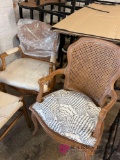 two Wicker chairs with cushions