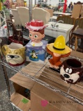 Collectible cups Jesse curious George Tasmanian devil and other miscellaneous