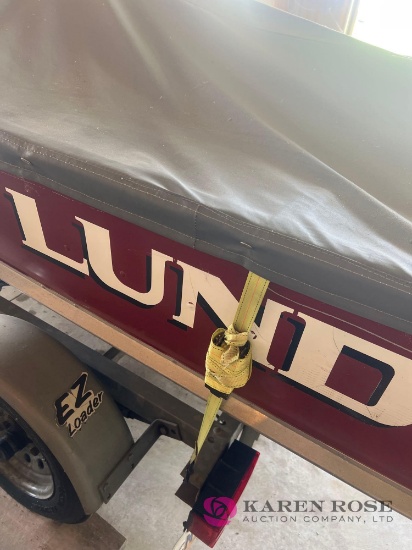 14 ft 4 person Lund boat and trailer and 9.9hp 0utboard motor