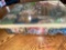 large box of , cake, decorations, and candles