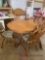 round table and chairs with leaf