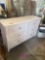 twin white bed with dresser