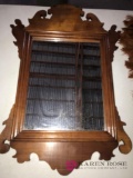 Bauers wooden framed mirror 18 in x 10 in