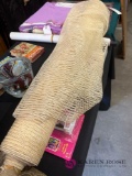 roll of cream sheer material