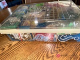 large box of , cake, decorations, and candles