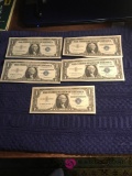 5- Crisp 1957 United States one dollar silver certificate with blue seal series A