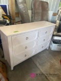 twin white bed with dresser