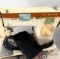 singer sewing machine bring help to load
