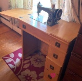 vintage sewing machine and table bring help to load