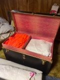 vintage trunk in basement bring help to load